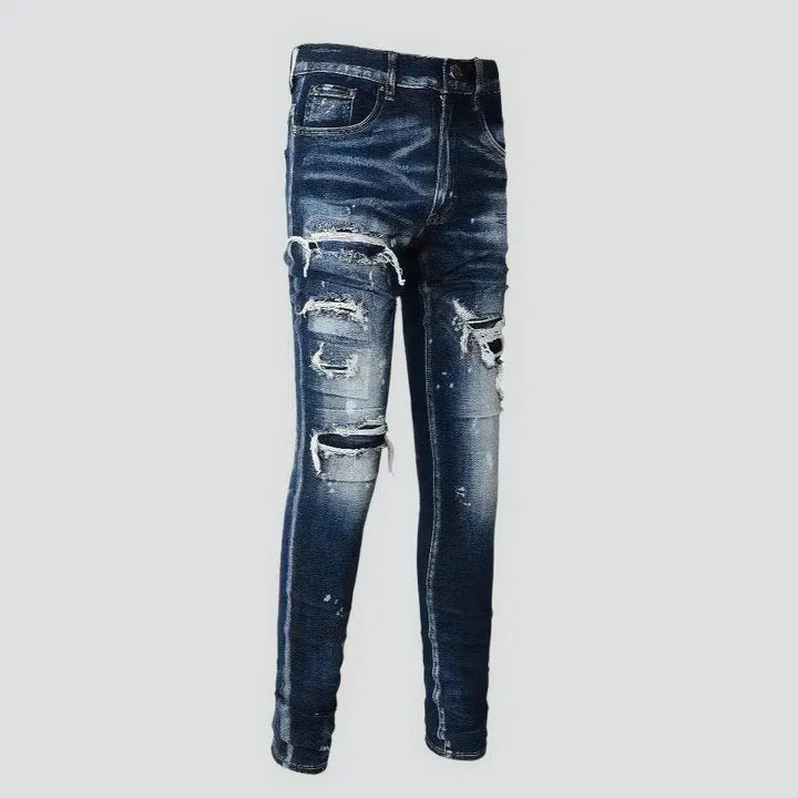 Dark-wash men's grunge jeans