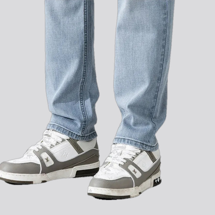 Mid rise light sanded men's jeans