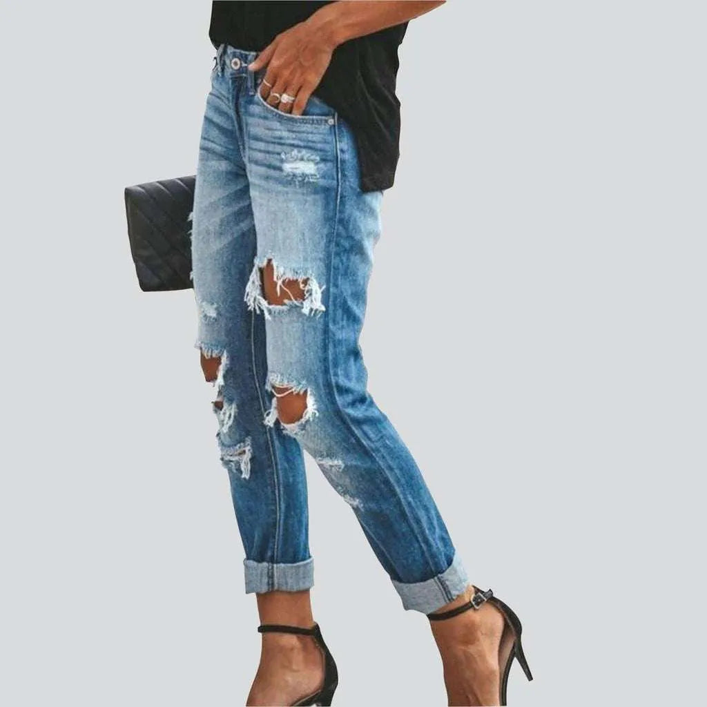 Light blue ripped women's jeans